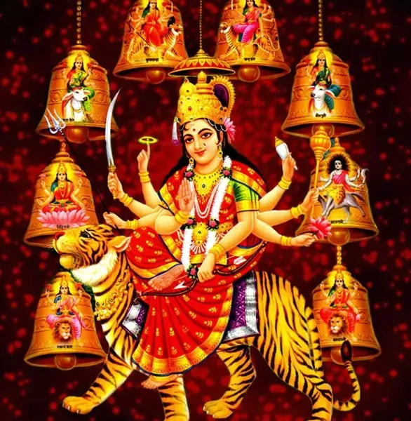 Multi-armed Hindu goddess riding a tiger, surrounded by golden temple bells featuring devotional deity images.